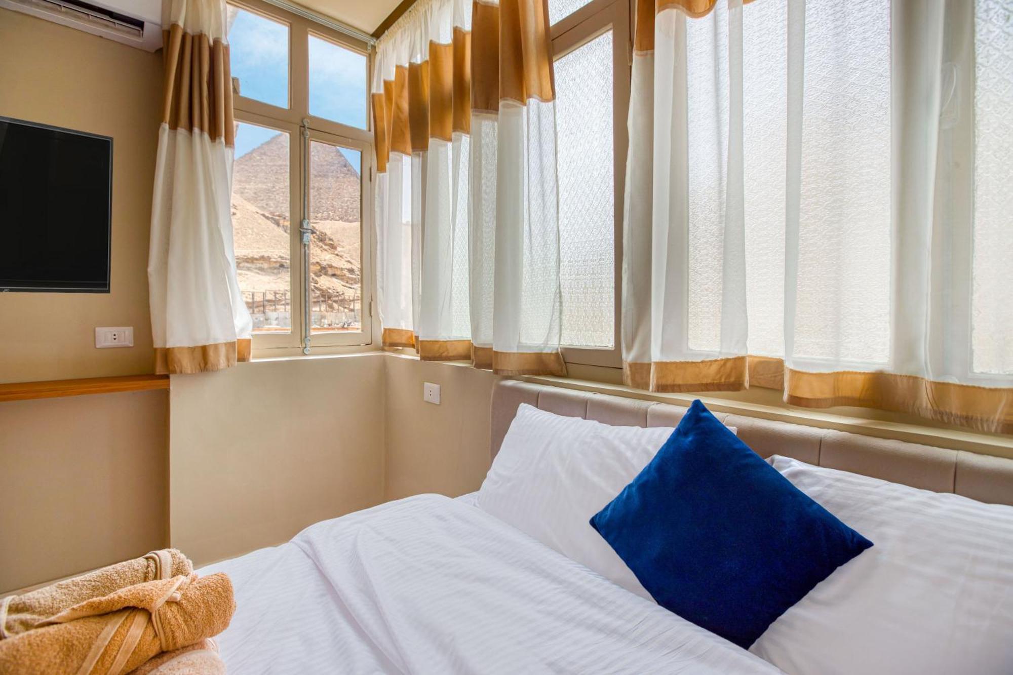 The Grand Pyramids View Hotel Kafret el-Gabal Room photo
