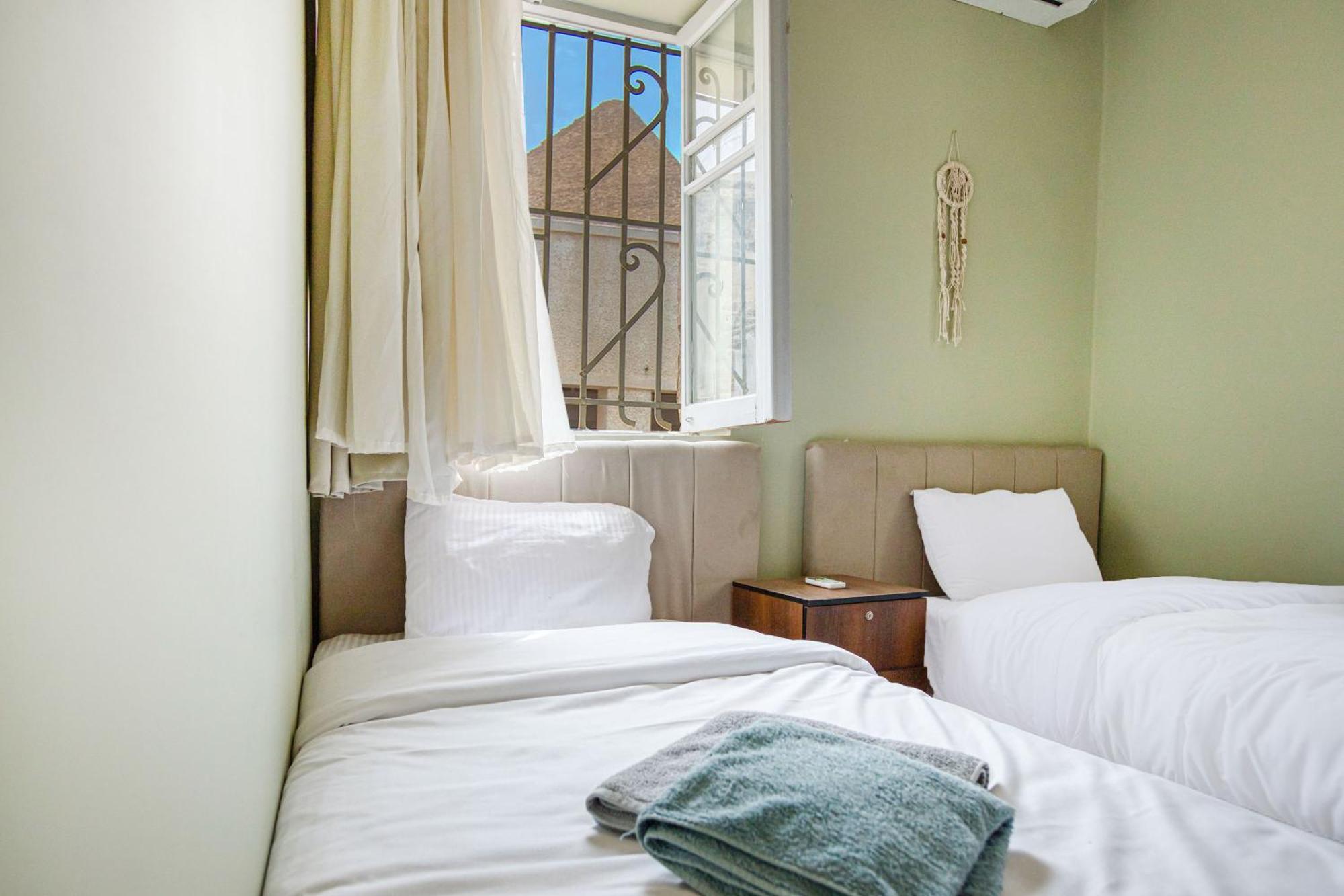 The Grand Pyramids View Hotel Kafret el-Gabal Room photo